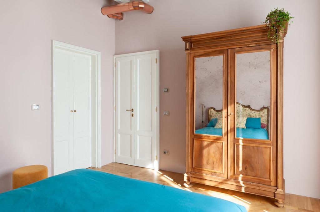 Postel nebo postele na pokoji v ubytování Ca' Maggiolina B&B