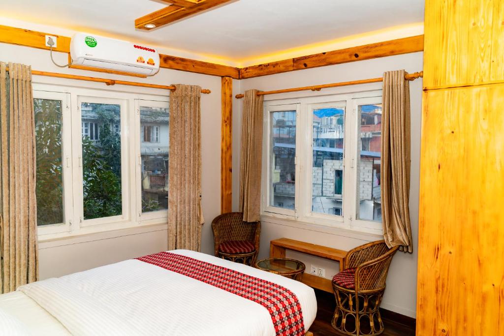 Postel nebo postele na pokoji v ubytování Silu Homes by Hostmandu