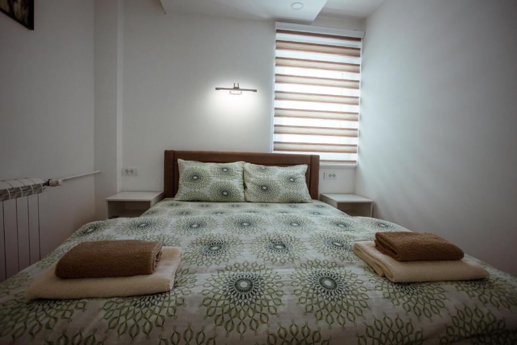 Posteľ alebo postele v izbe v ubytovaní Apartman Vesna