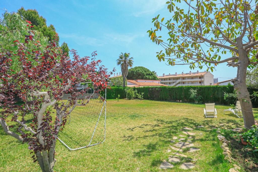 Zahrada ubytování LITORAL COSTA DORADA - CASA AUSTRAL Only families