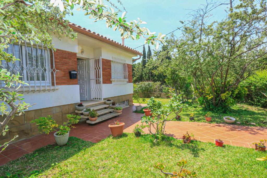 Zahrada ubytování LITORAL COSTA DORADA - CASA AUSTRAL Only families