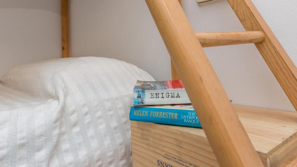 A bed or beds in a room at Apartment Cand 2 - Calella de Palafrugell