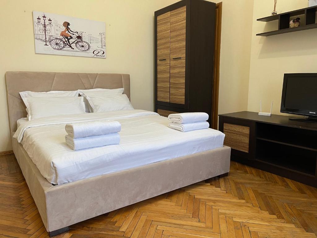 Postel nebo postele na pokoji v ubytování Avangard Green Park 1 Apart