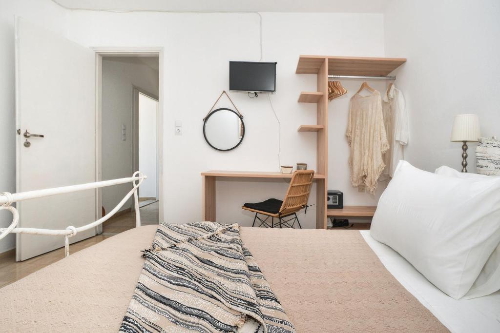 Postel nebo postele na pokoji v ubytování New! PaxosWhite Sea View Apartments & Studios!