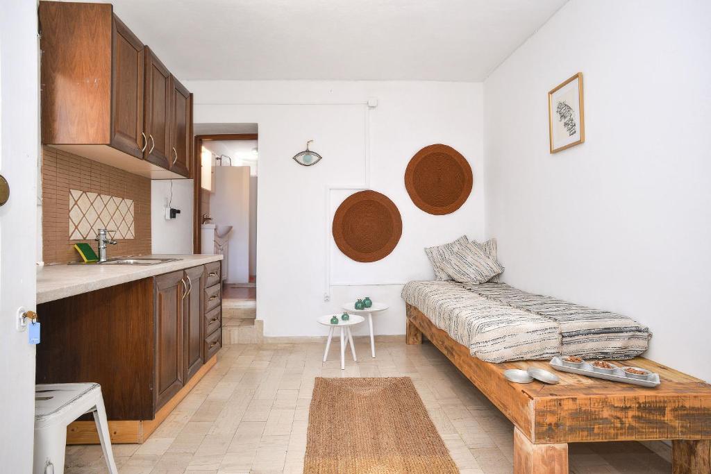 Postel nebo postele na pokoji v ubytování New! PaxosWhite Sea View Apartments & Studios!