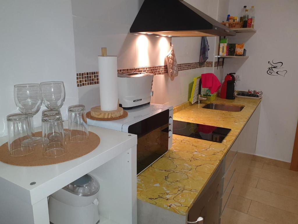 Kuchyňa alebo kuchynka v ubytovaní Apartamentos Naranja y Limòn