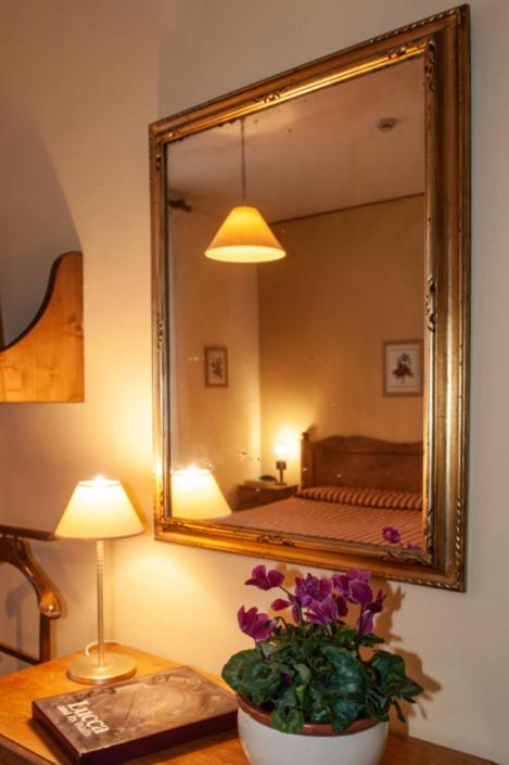 Postel nebo postele na pokoji v ubytování Hotel Melecchi