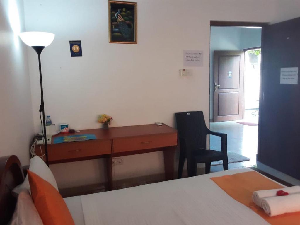 Postel nebo postele na pokoji v ubytování Villa DeLorenta