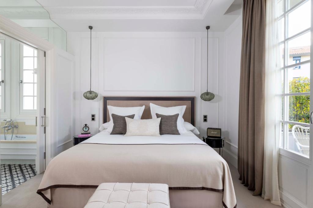Postel nebo postele na pokoji v ubytování Villa Magalean Hotel & Spa