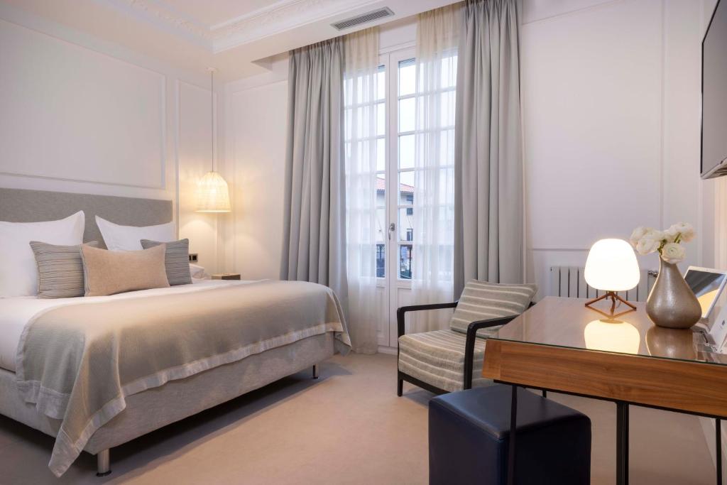 Postel nebo postele na pokoji v ubytování Villa Magalean Hotel & Spa