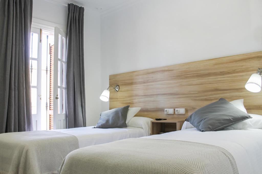 Postel nebo postele na pokoji v ubytování Hotel Restaurante Vía Sevilla - Cádiz by MA 22 Puntos