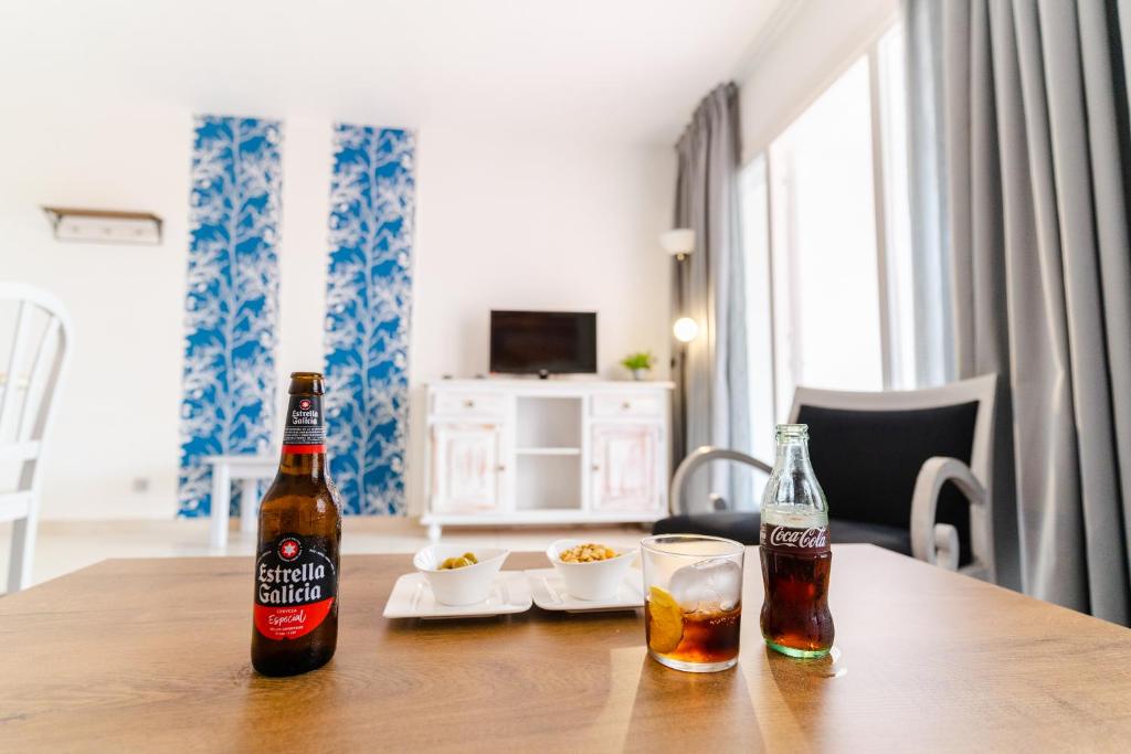 Nápoje v ubytování Apartamentos Royal Life