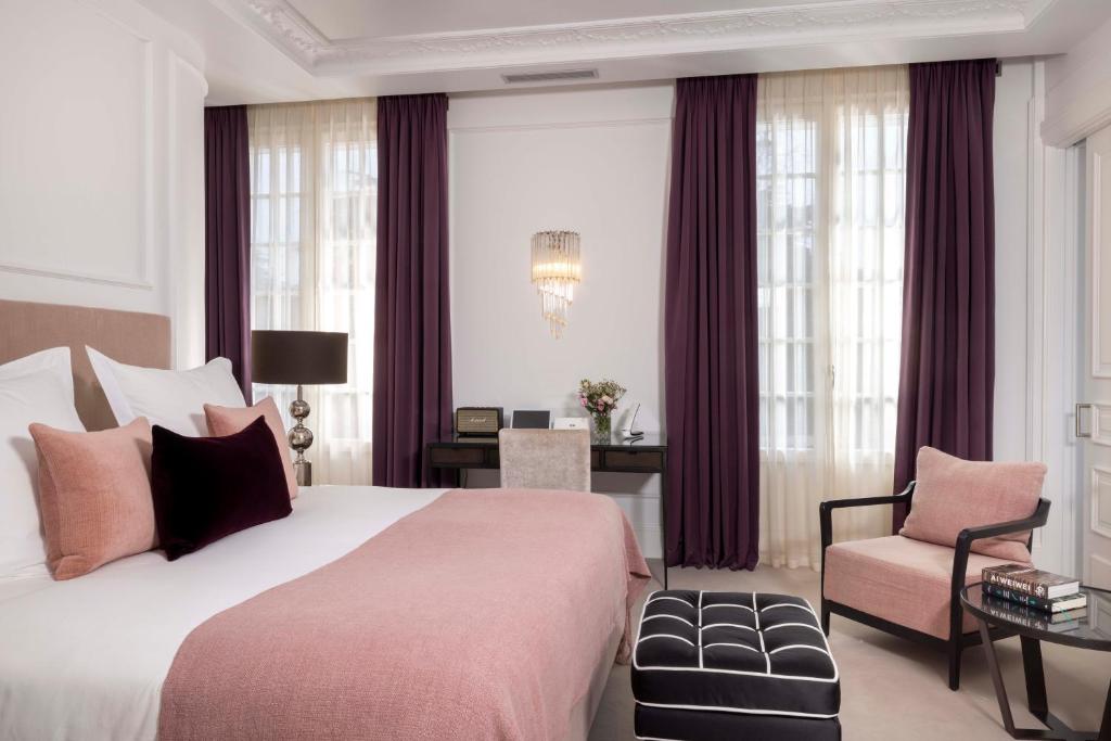 Postel nebo postele na pokoji v ubytování Villa Magalean Hotel & Spa