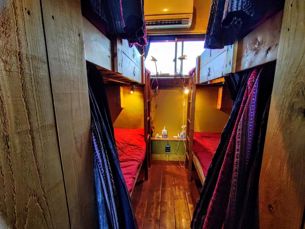 Postel nebo postele na pokoji v ubytování Guest House mii