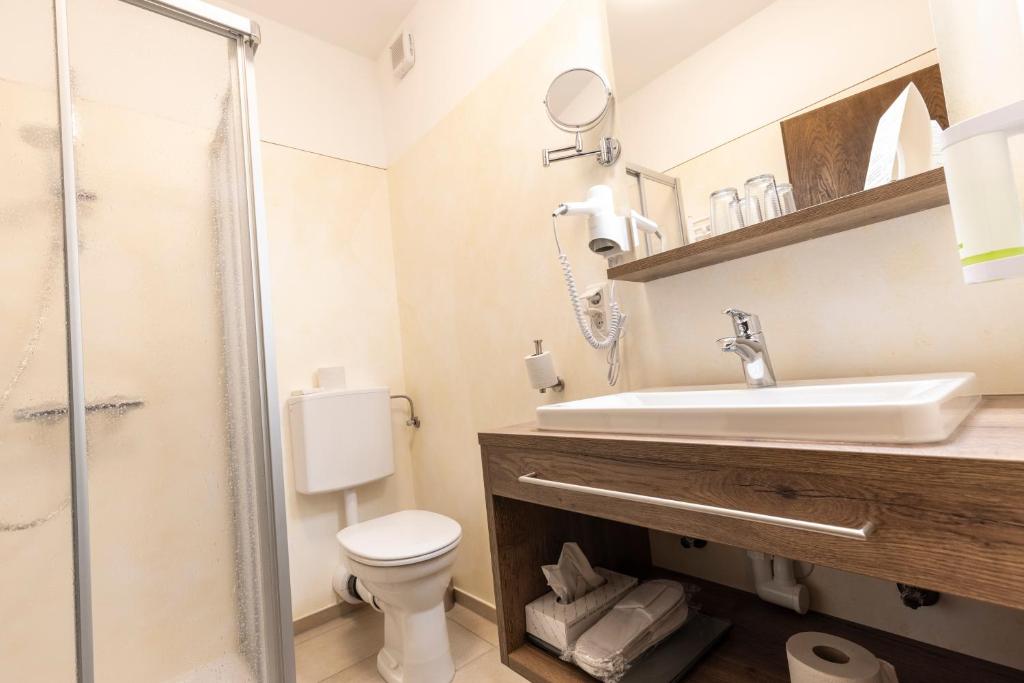 Koupelna v ubytování Alpenhotel Ensmann