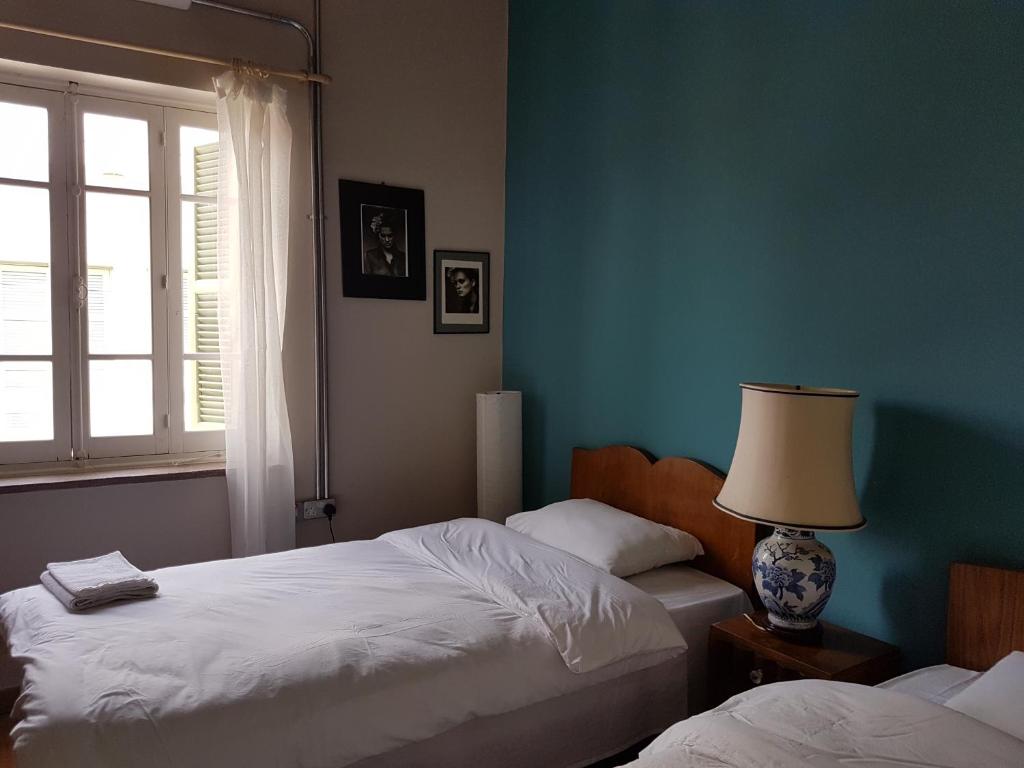 Postel nebo postele na pokoji v ubytování Ines Guest House