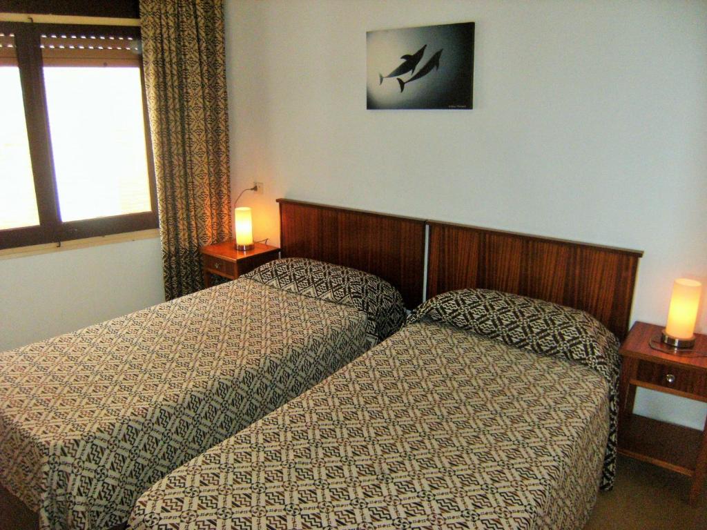 Posteľ alebo postele v izbe v ubytovaní Marina 1-A