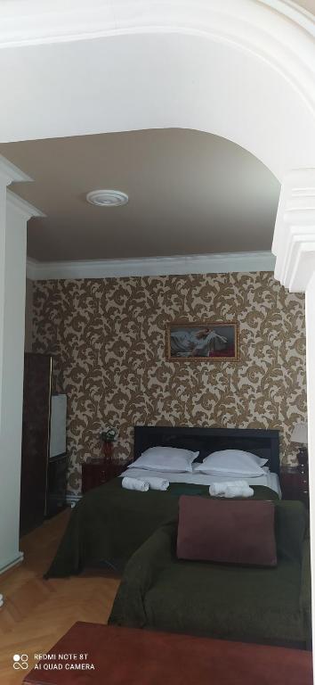 Postel nebo postele na pokoji v ubytování Hotel ,,Tengo,,