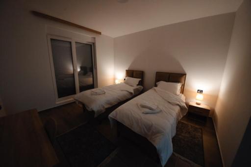 Postel nebo postele na pokoji v ubytování Zlatna Nit