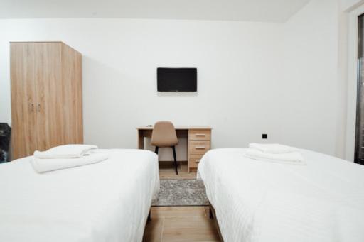 Postel nebo postele na pokoji v ubytování Zlatna Nit