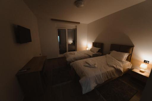 Postel nebo postele na pokoji v ubytování Zlatna Nit