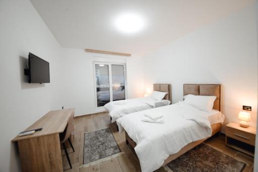 Postel nebo postele na pokoji v ubytování Zlatna Nit