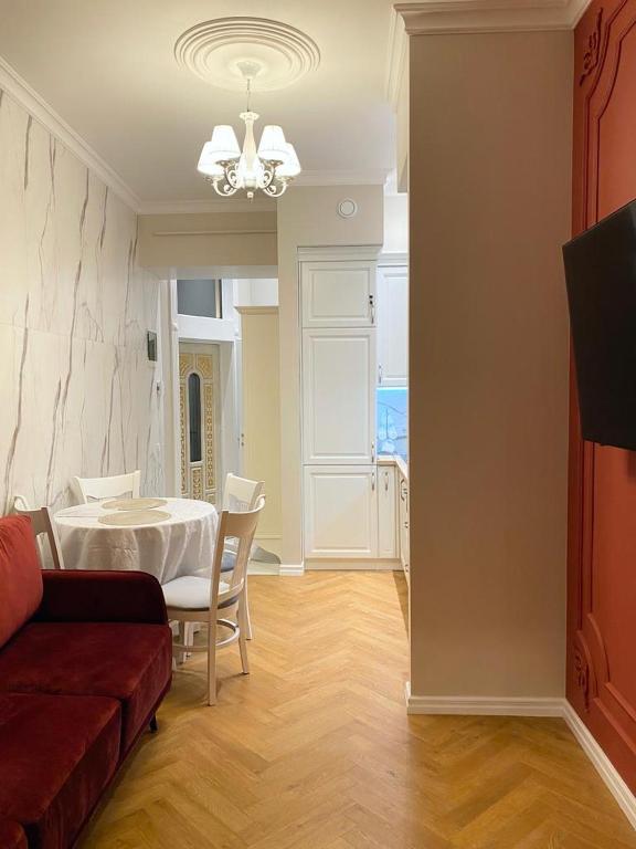 TV a/nebo společenská místnost v ubytování Grand de Luxe Residence Lviv