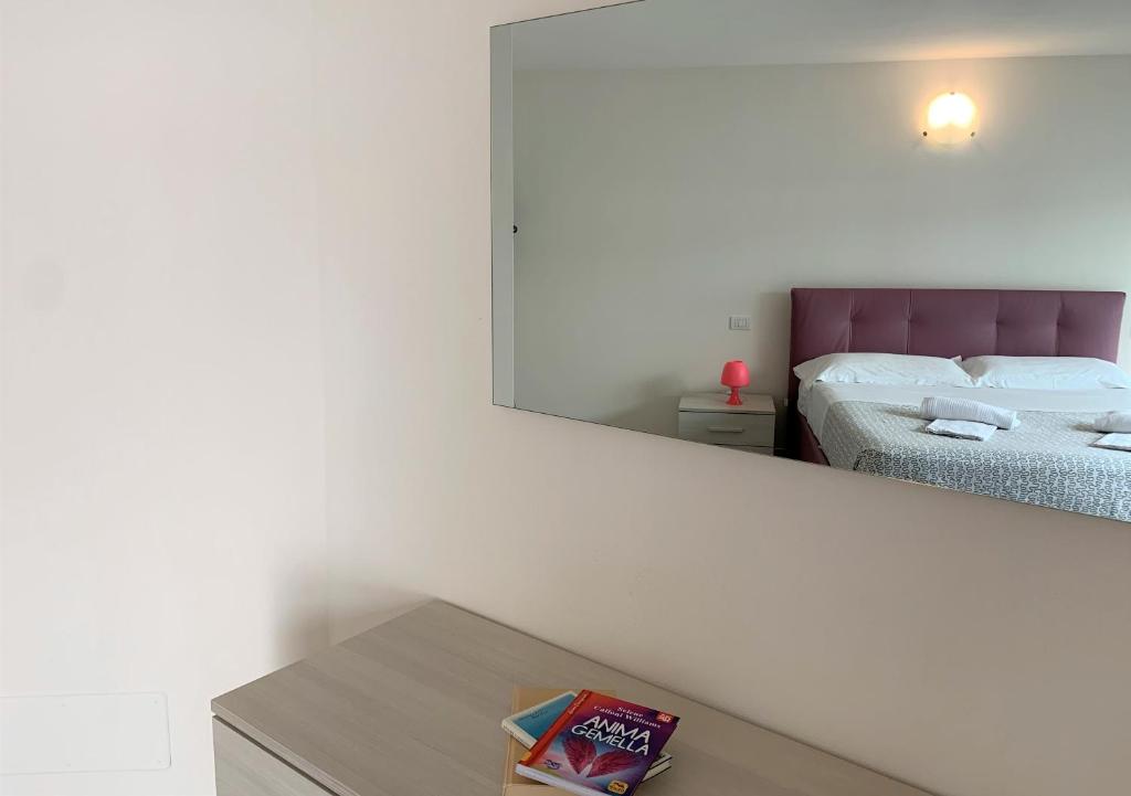 Postel nebo postele na pokoji v ubytování Camere e case vacanza Residenza Prealba