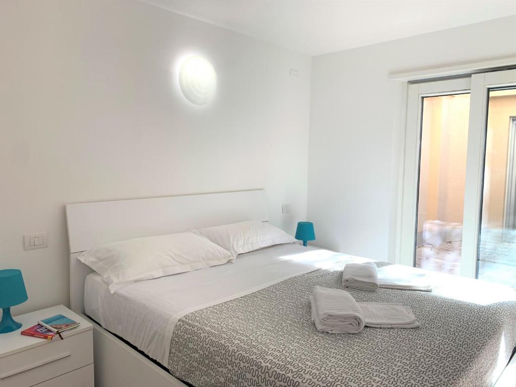 Postel nebo postele na pokoji v ubytování Camere e case vacanza Residenza Prealba