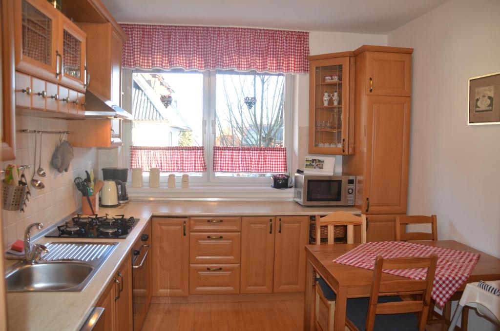 Kuchyň nebo kuchyňský kout v ubytování Villa Tatran