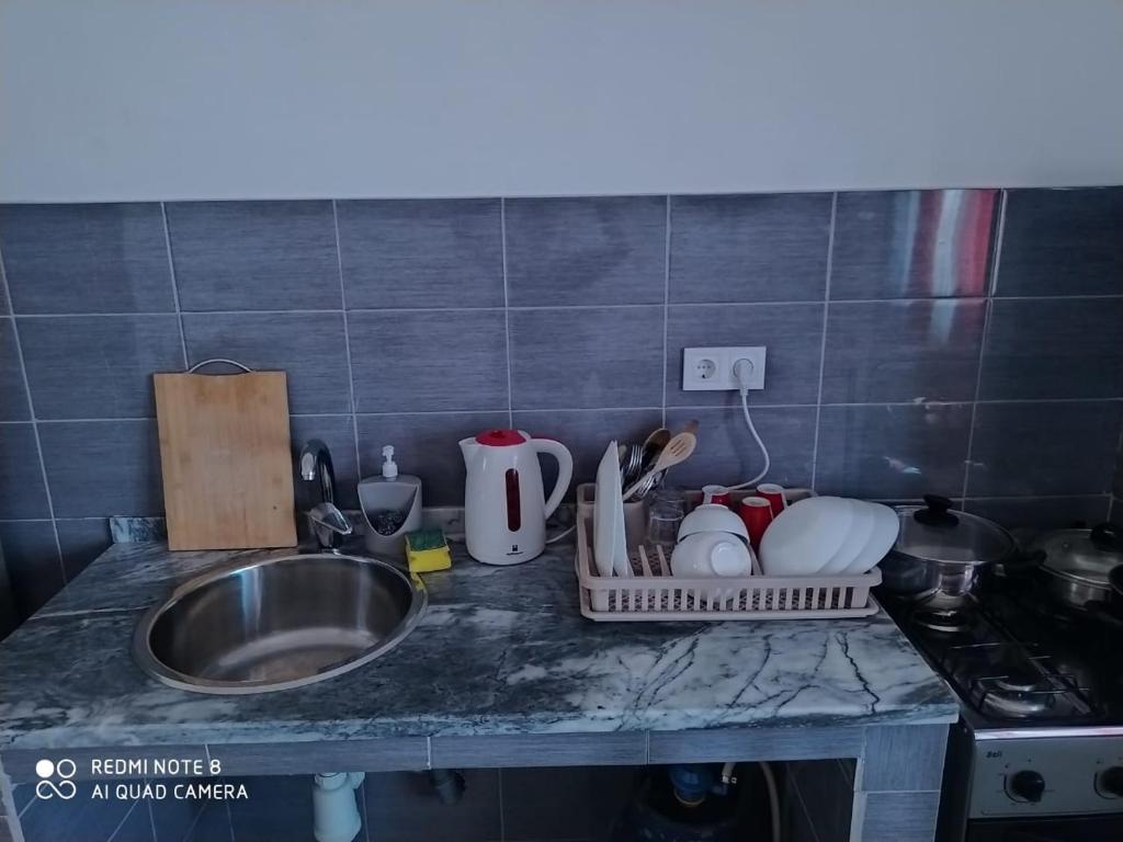 Kuchyň nebo kuchyňský kout v ubytování Guest House Maio