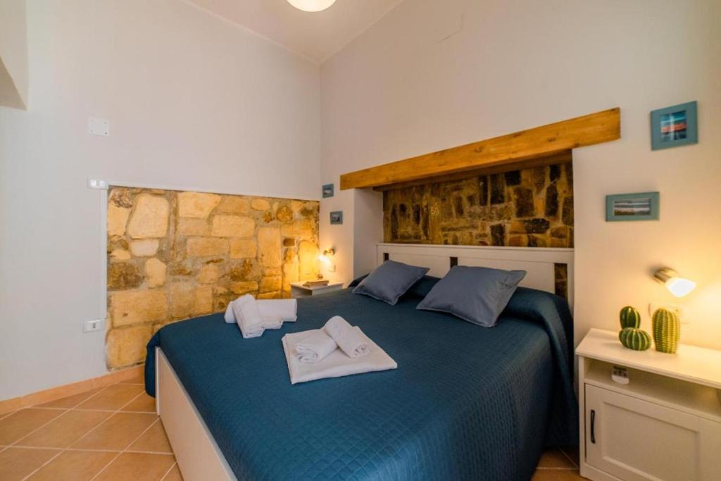 Posteľ alebo postele v izbe v ubytovaní Civico Dieci Holiday Home