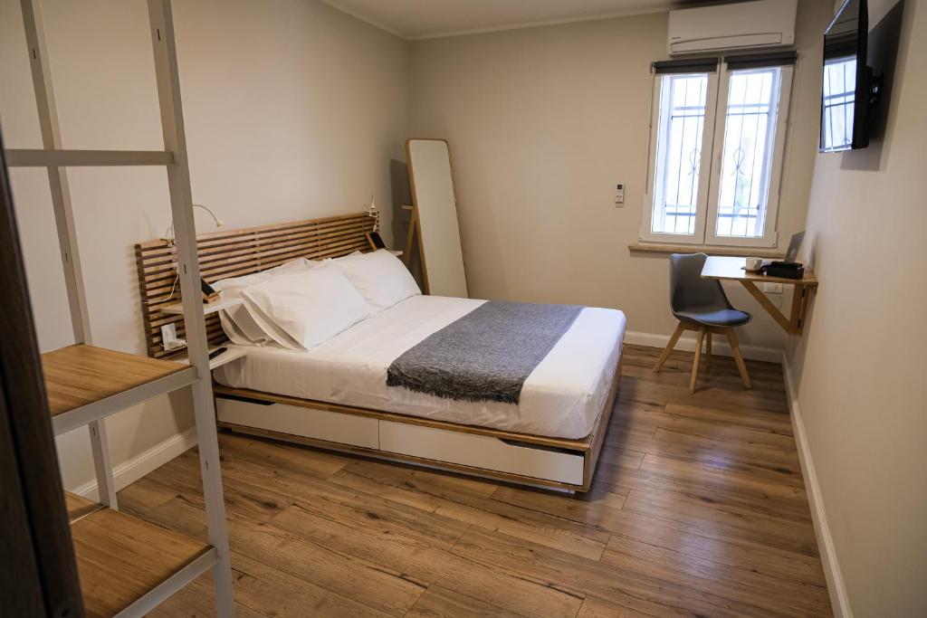 Posteľ alebo postele v izbe v ubytovaní B&B Civico 35