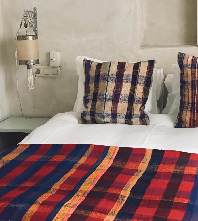 Postel nebo postele na pokoji v ubytování Apartamentos Caravane