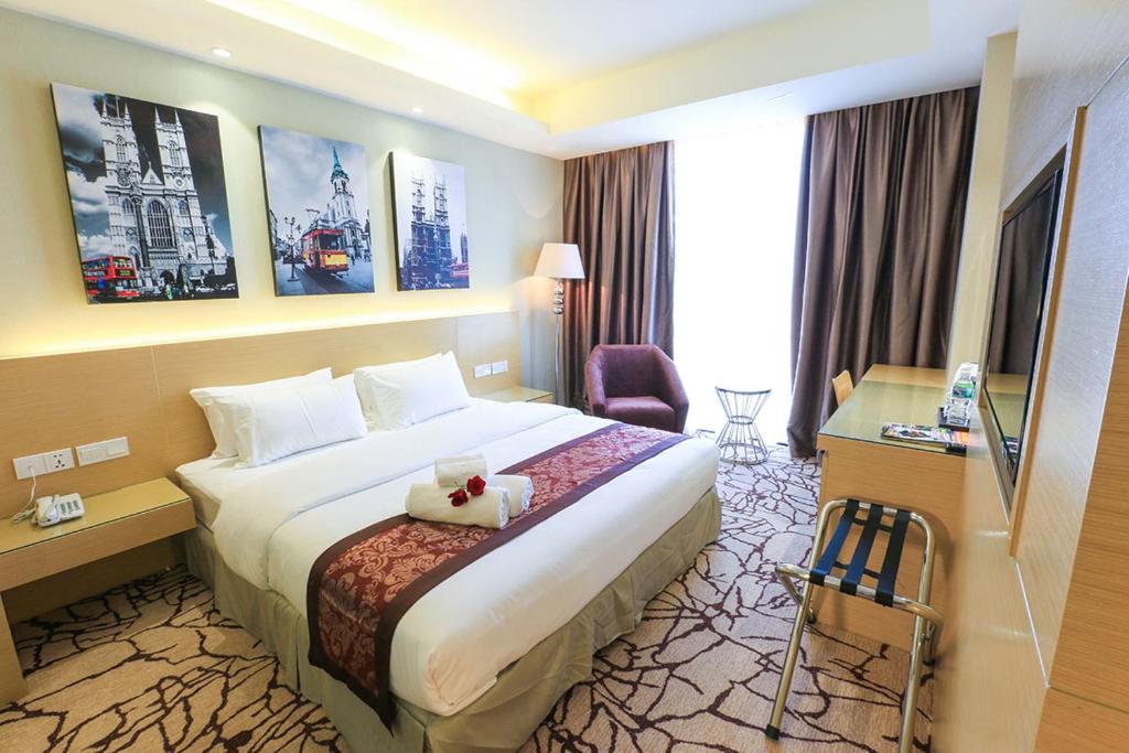 Postel nebo postele na pokoji v ubytování Eco Tree Hotel, Melaka