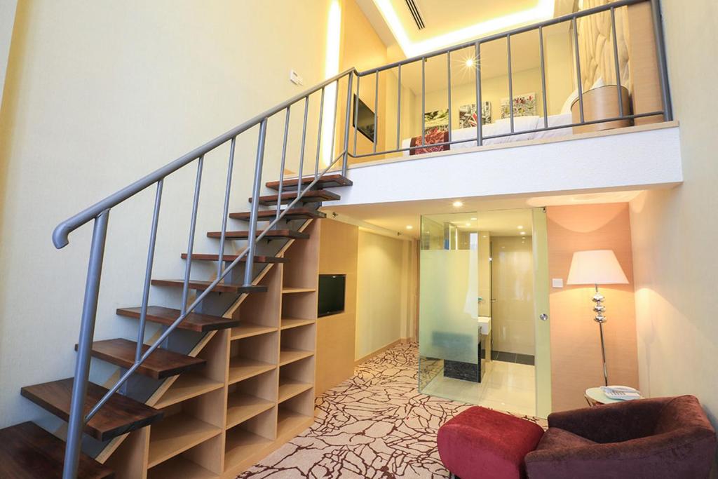 TV a/nebo společenská místnost v ubytování Eco Tree Hotel, Melaka
