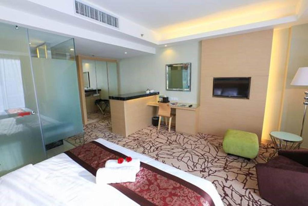 TV a/nebo společenská místnost v ubytování Eco Tree Hotel, Melaka