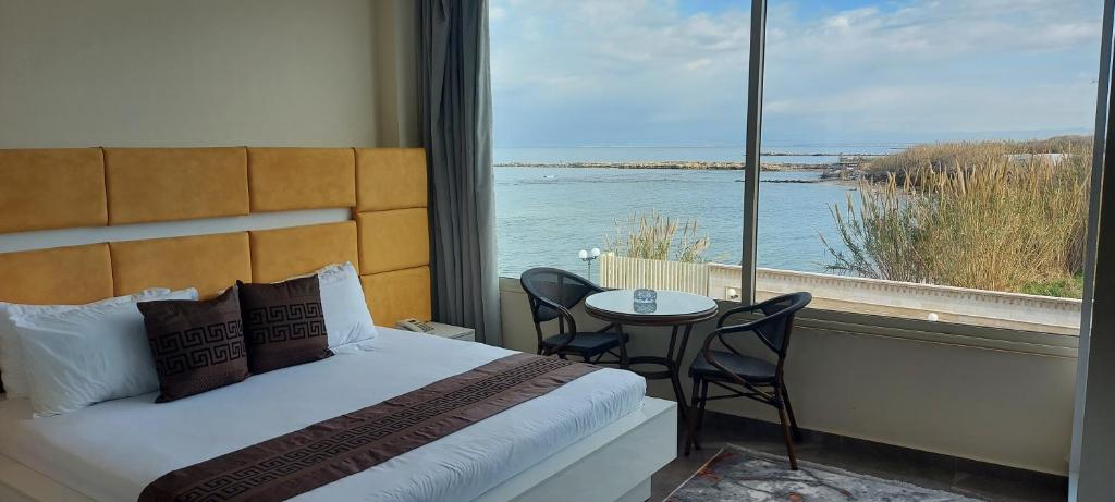 Postel nebo postele na pokoji v ubytování Aquarius Touristic Resort