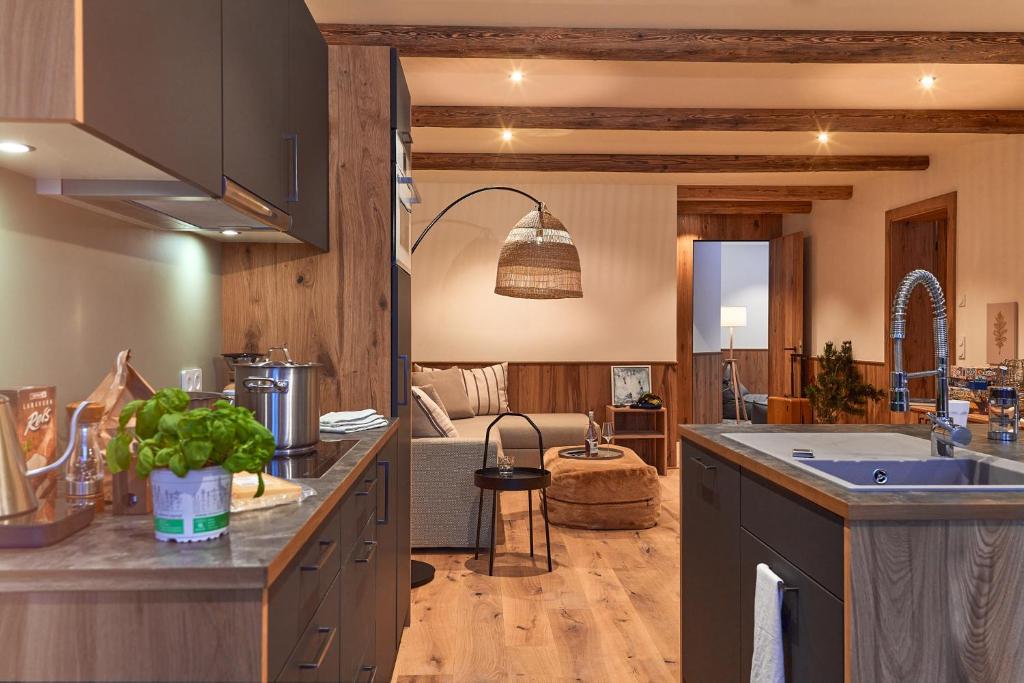 Kuchyň nebo kuchyňský kout v ubytování Berghaus Schröcken - Hotel Apartments Spa