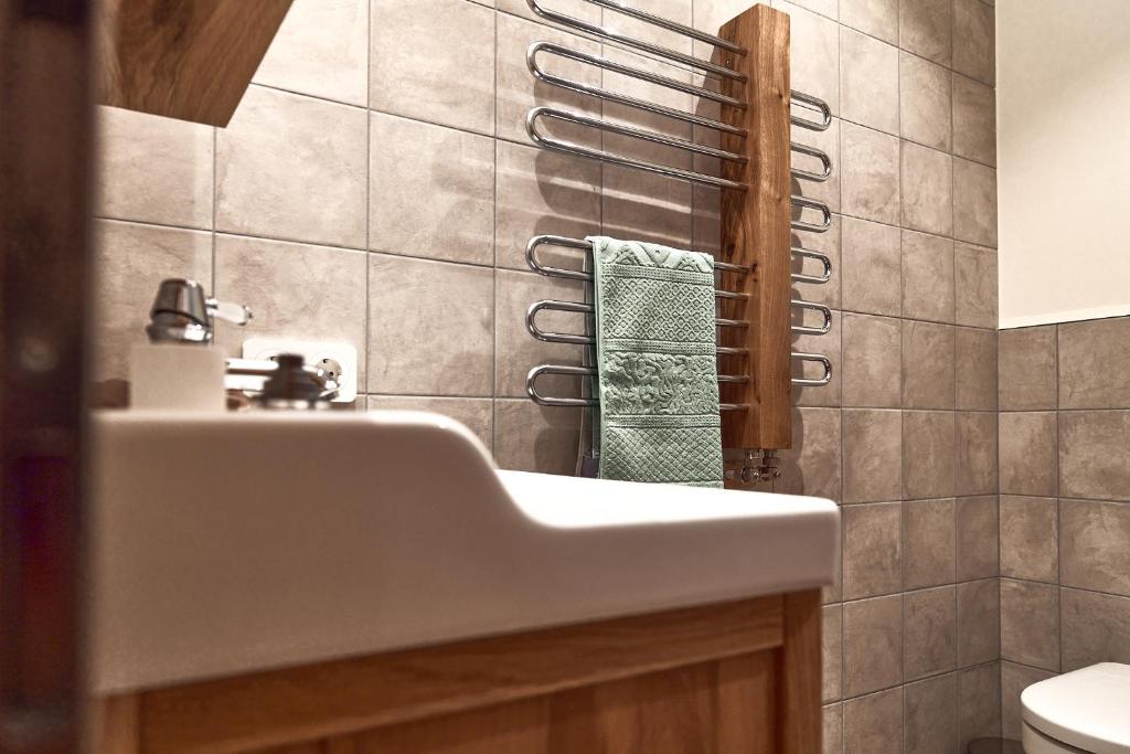 Koupelna v ubytování Berghaus Schröcken - Hotel Apartments Spa