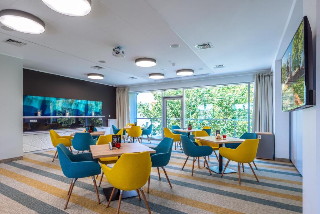 TV a/nebo společenská místnost v ubytování Hotel Zorza