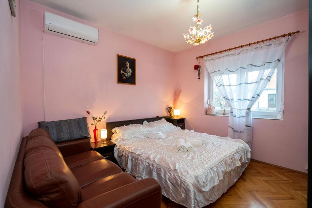 Postel nebo postele na pokoji v ubytování Apartman JOZIC