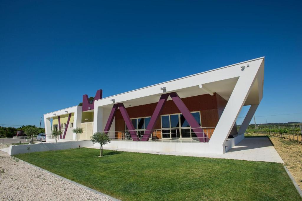 a rendering of a building with a triangular facade at Quinta Monteiro de Matos - Enoturismo in Santarém