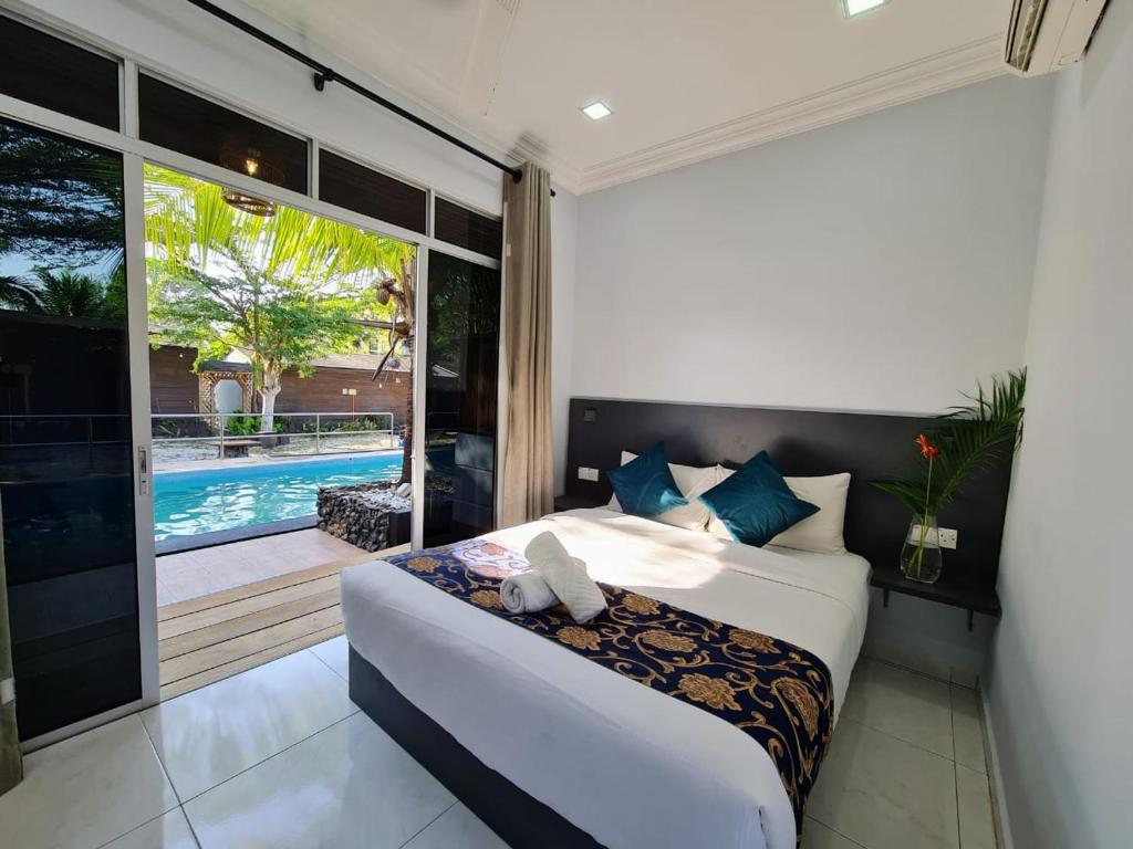 Katil atau katil-katil dalam bilik di Airis Sanctuary Resort