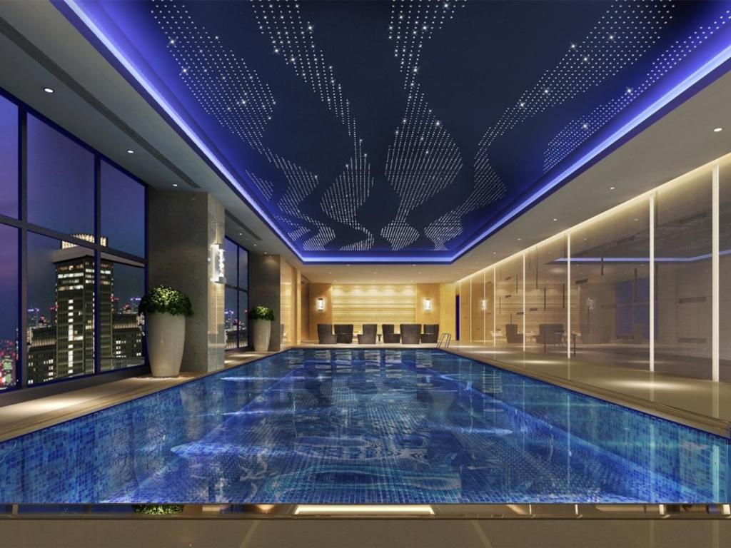 Bazén v ubytování Wanda Realm Guangzhou Zengcheng nebo v jeho okolí