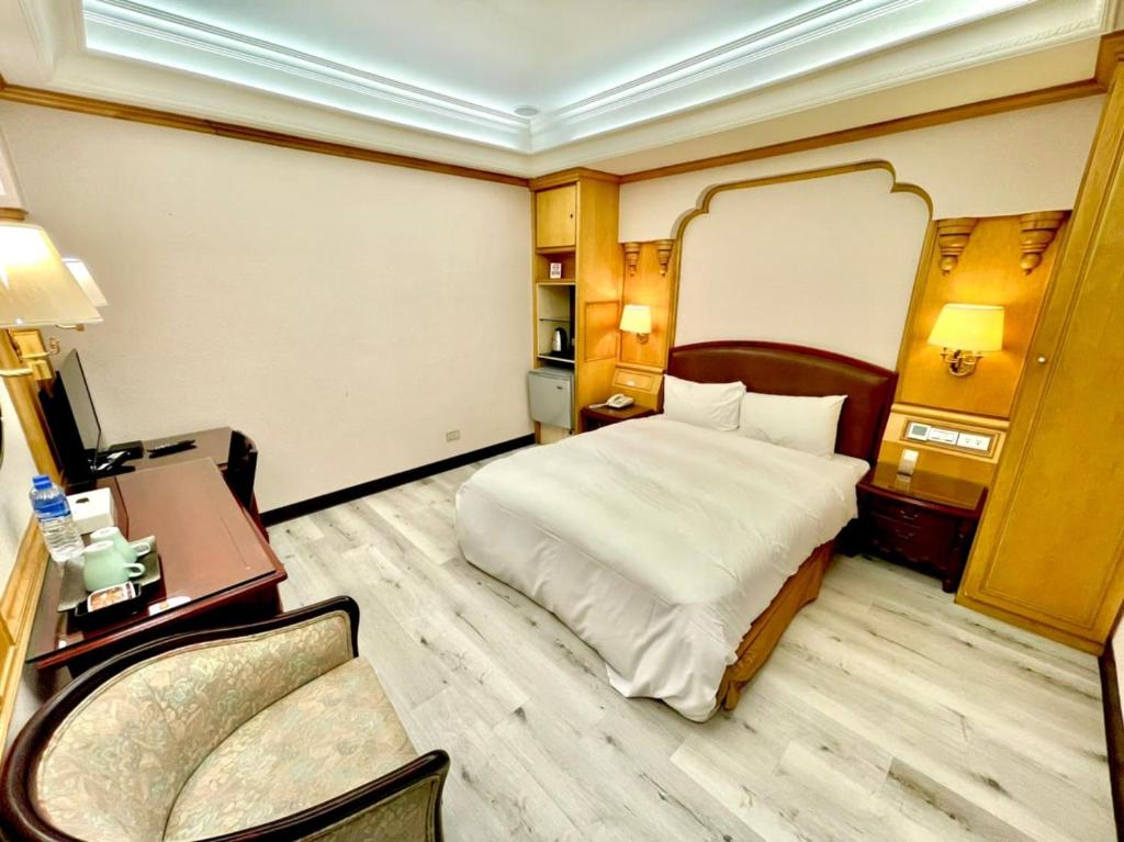 Кровать или кровати в номере Dasin