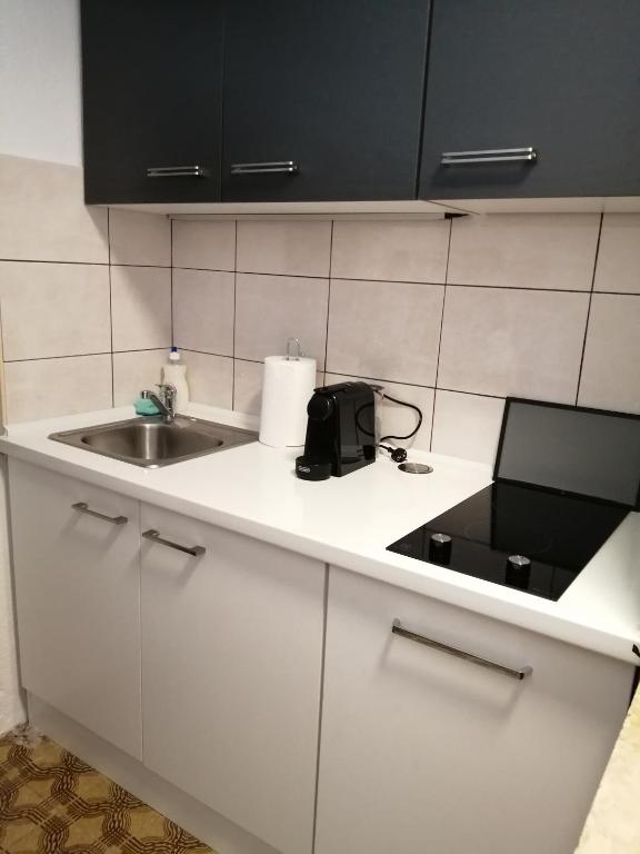 Kuchyň nebo kuchyňský kout v ubytování House Nordika
