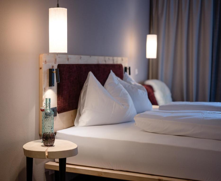 Кровать или кровати в номере Hotel Mühlenerhof