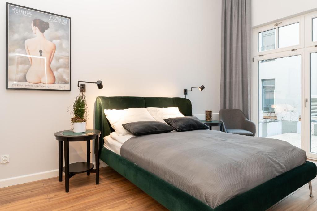 Posteľ alebo postele v izbe v ubytovaní Prince4You Apartments