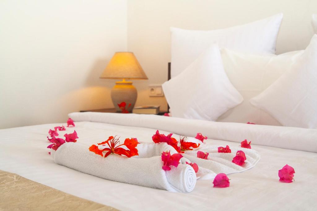Postel nebo postele na pokoji v ubytování Alladin Boutique Beach Hotel and SPA Zanzibar